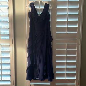 Royal blue cocktail dress with ruffle detail.  Worn once. From Saks Fifth Avenue